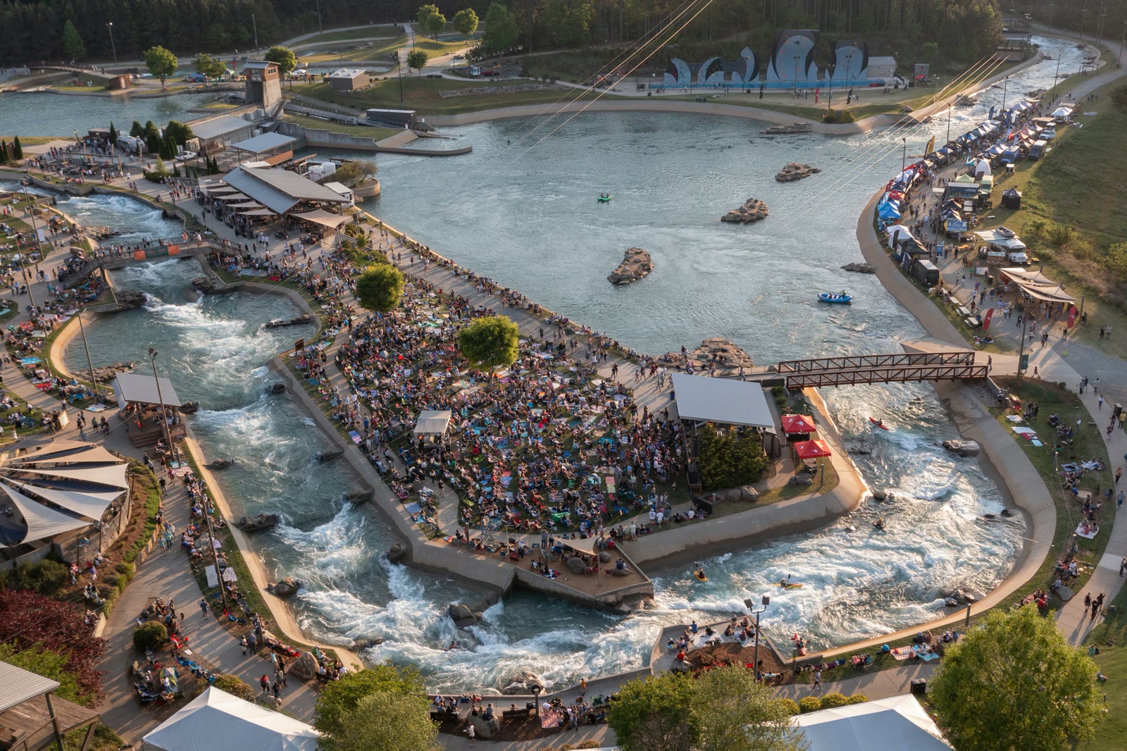 Aerial view of the U.S. National Whitewater Center rapids and crowds